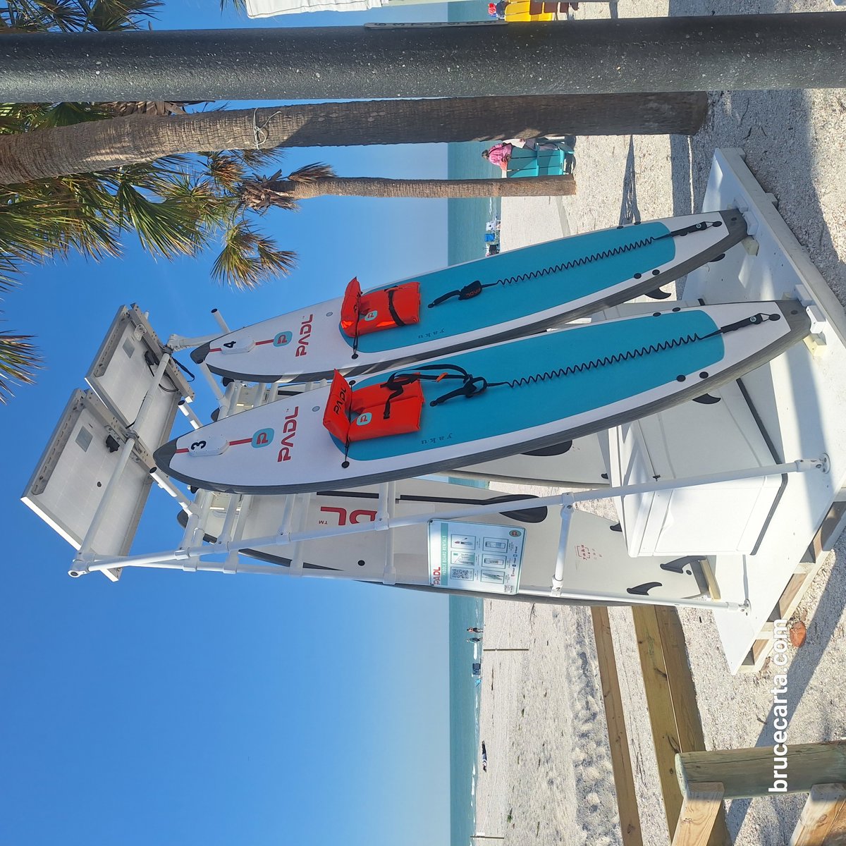 Sunny Beach Paddleboards Vibrant Atmosphere Capture.jpg