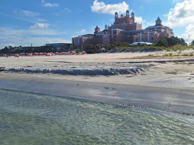 Sunny Beachfront Reflection Blue Sky Scene.jpg