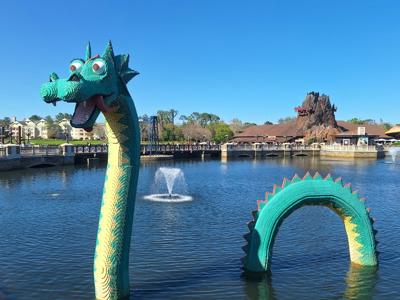 Vibrant Calm Lake Dragon Sculpture Serenity Moment.jpg