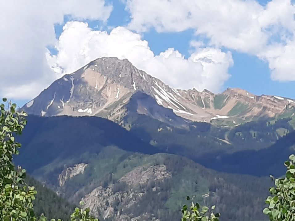 Majestic Mountain Peak Clear Sky Moment.jpg