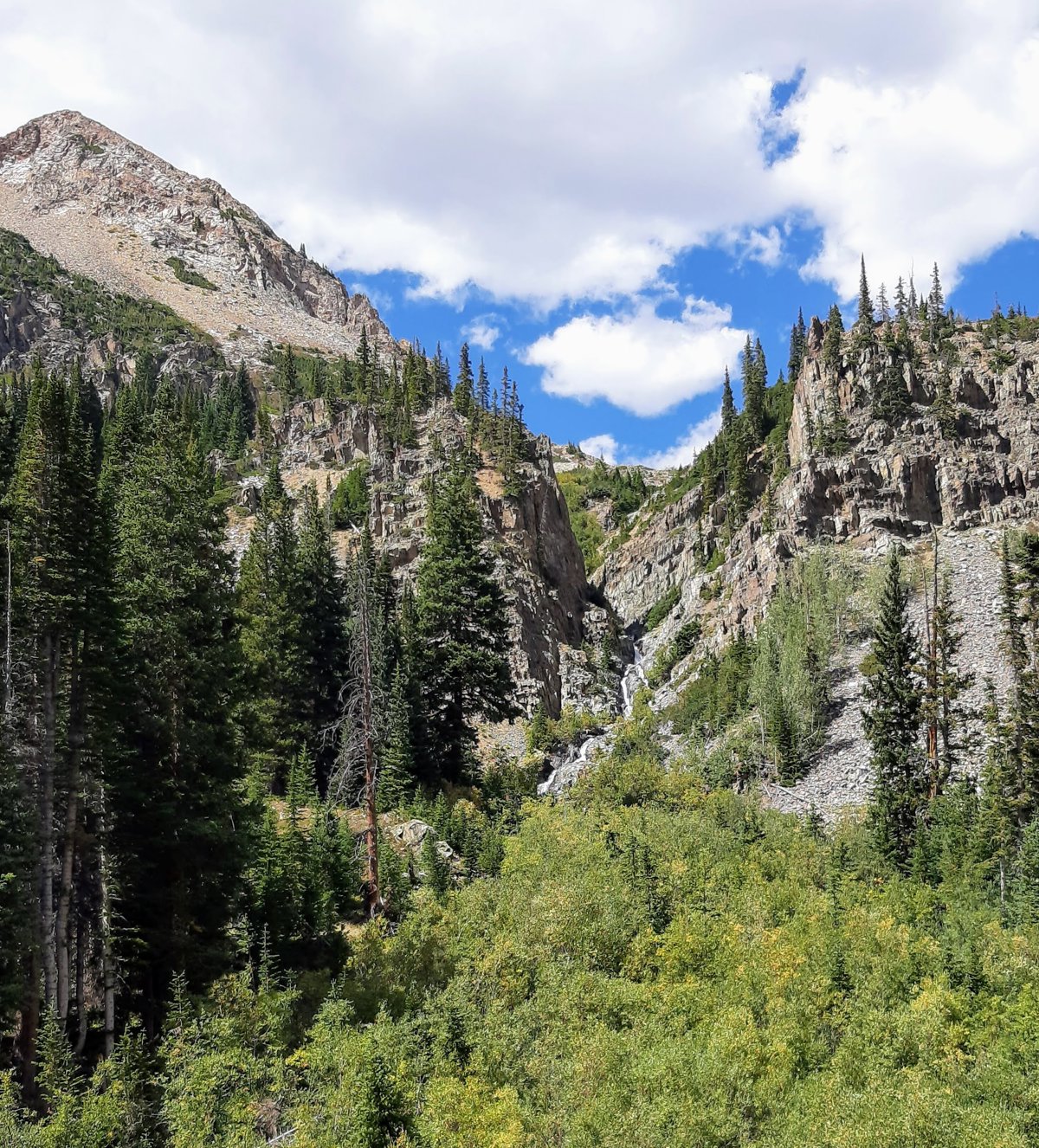 Sunny Mountain Valley Cascade Panorama.jpg
