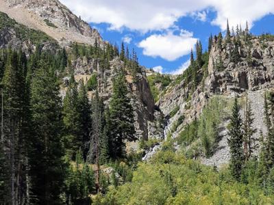 Sunny Mountain Valley Cascade Panorama.jpg