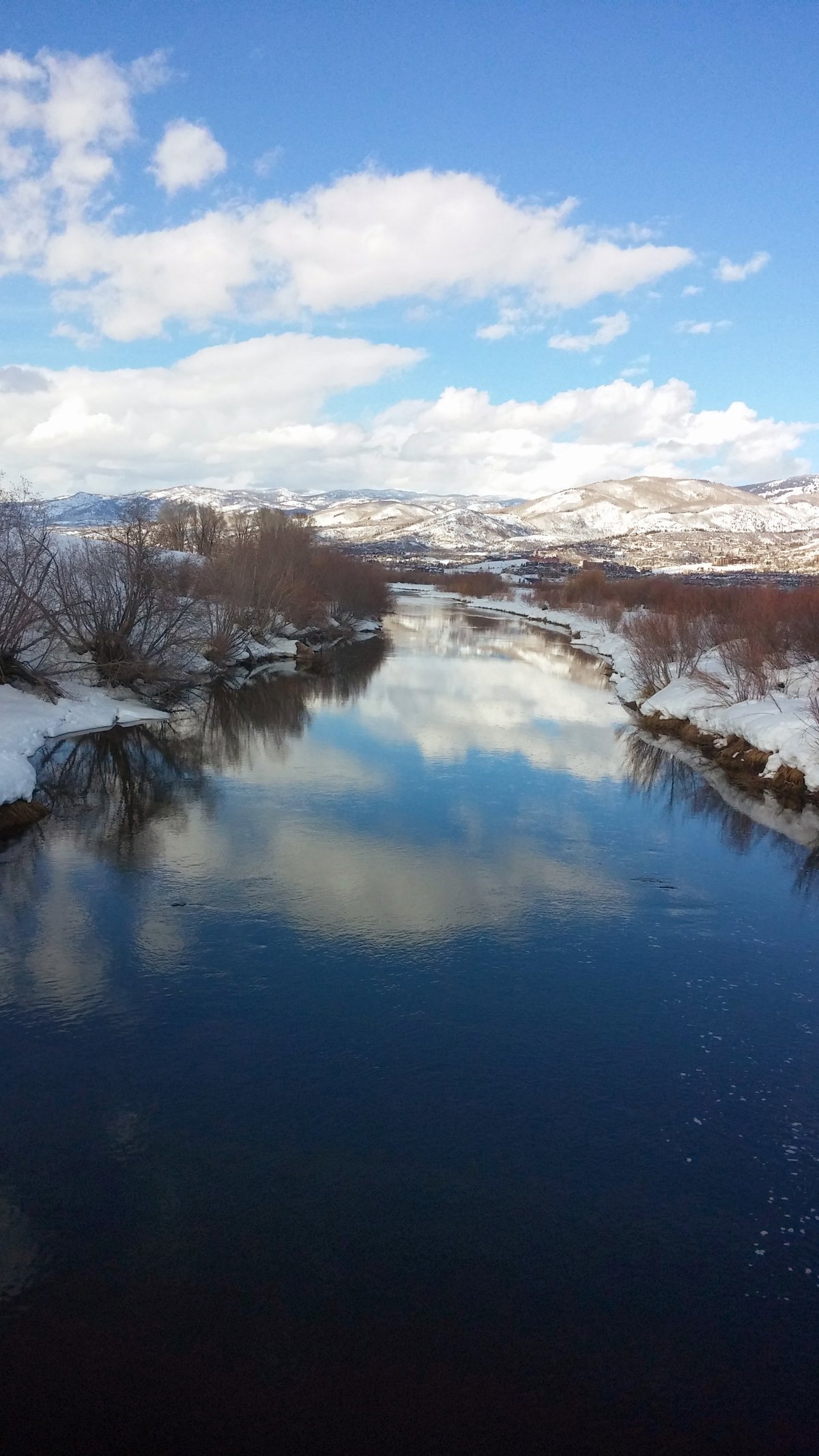 Serene Winter River Reflections Capture.jpg