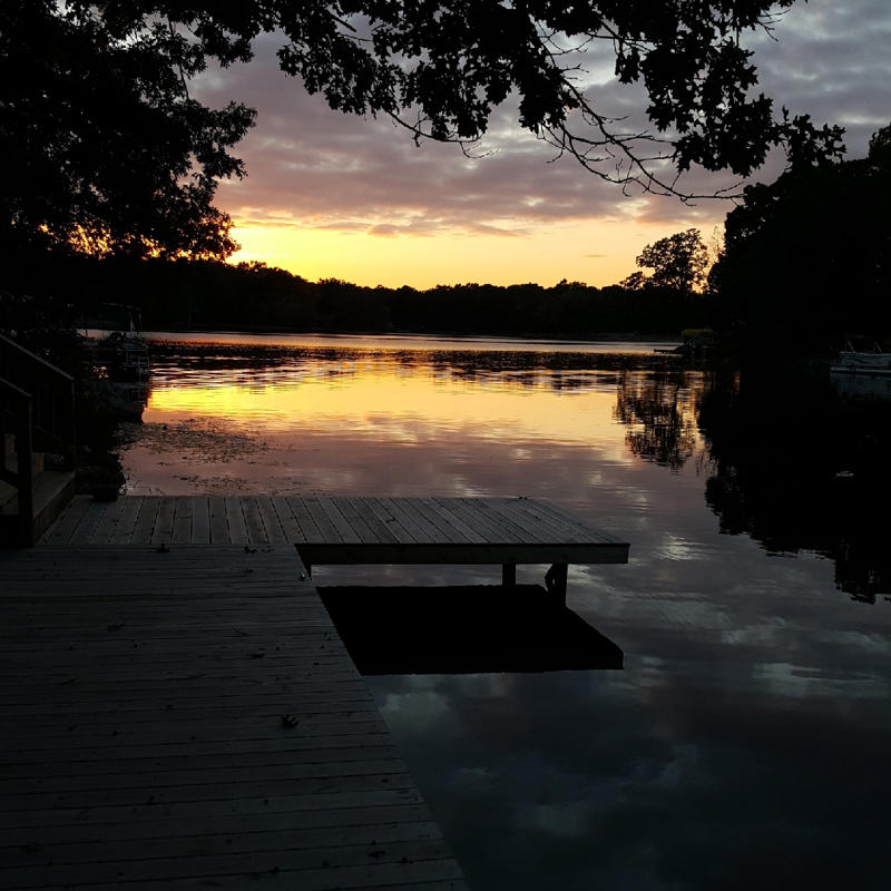 Golden Sunset Reflections Calm Lake Silhouette View.jpg
